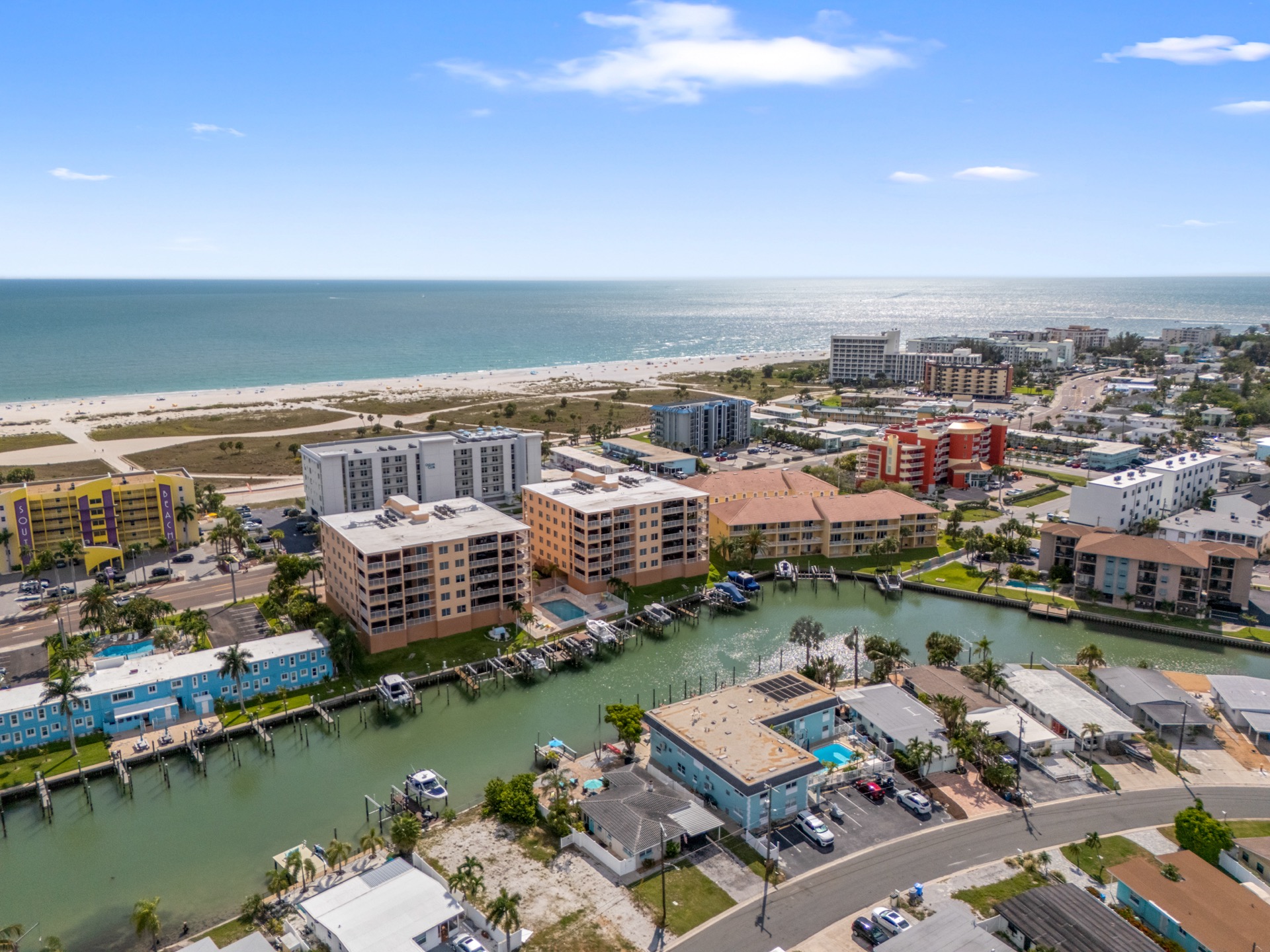 Aerial view of Treasure Island on the Florida Gulf Coast, with the beach and a boat canal