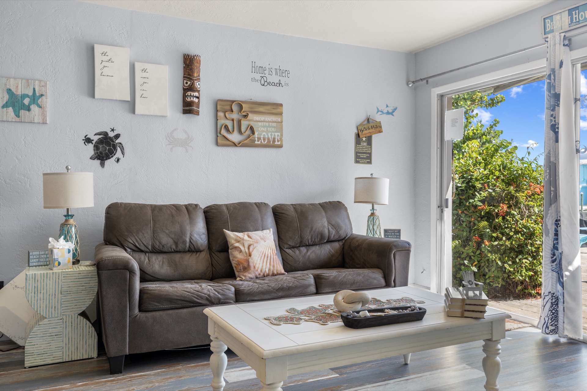 A styled, professionally photographed living room in a Premier STR managed home
